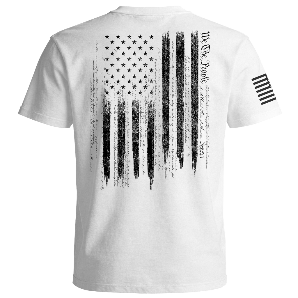 White t-shirt with black American flag design on the back and a small flag patch on the sleeve against a white background.