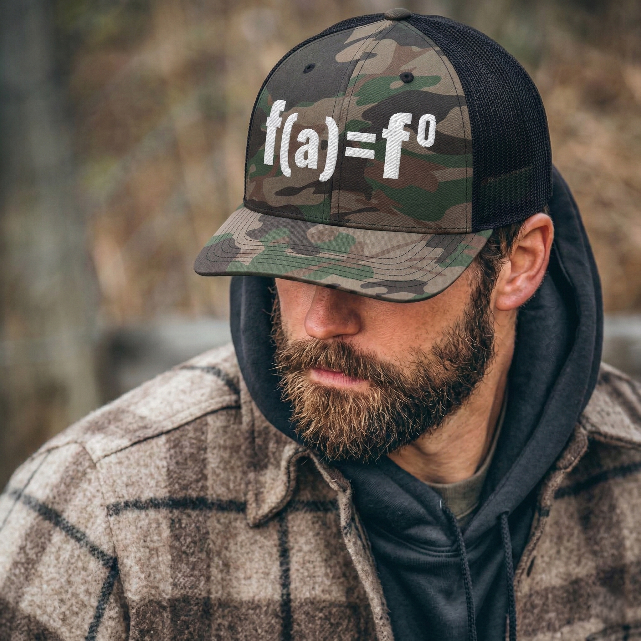a man wearing a camo black patriotic trucker hat with FAFO bold embroidered design, structured six panel mesh back adjustable hat