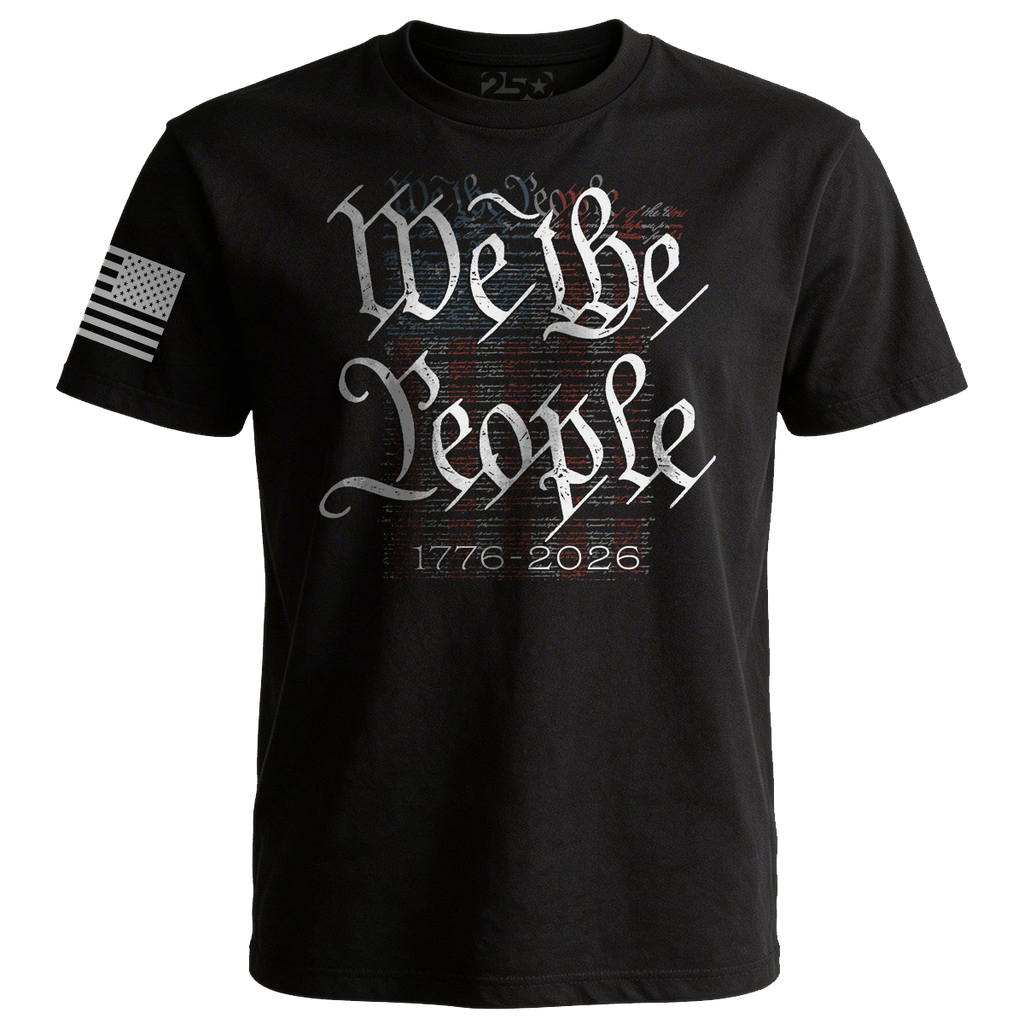 Black We The People 1776–2026 t-shirt featuring vintage script over Declaration of Independence document background