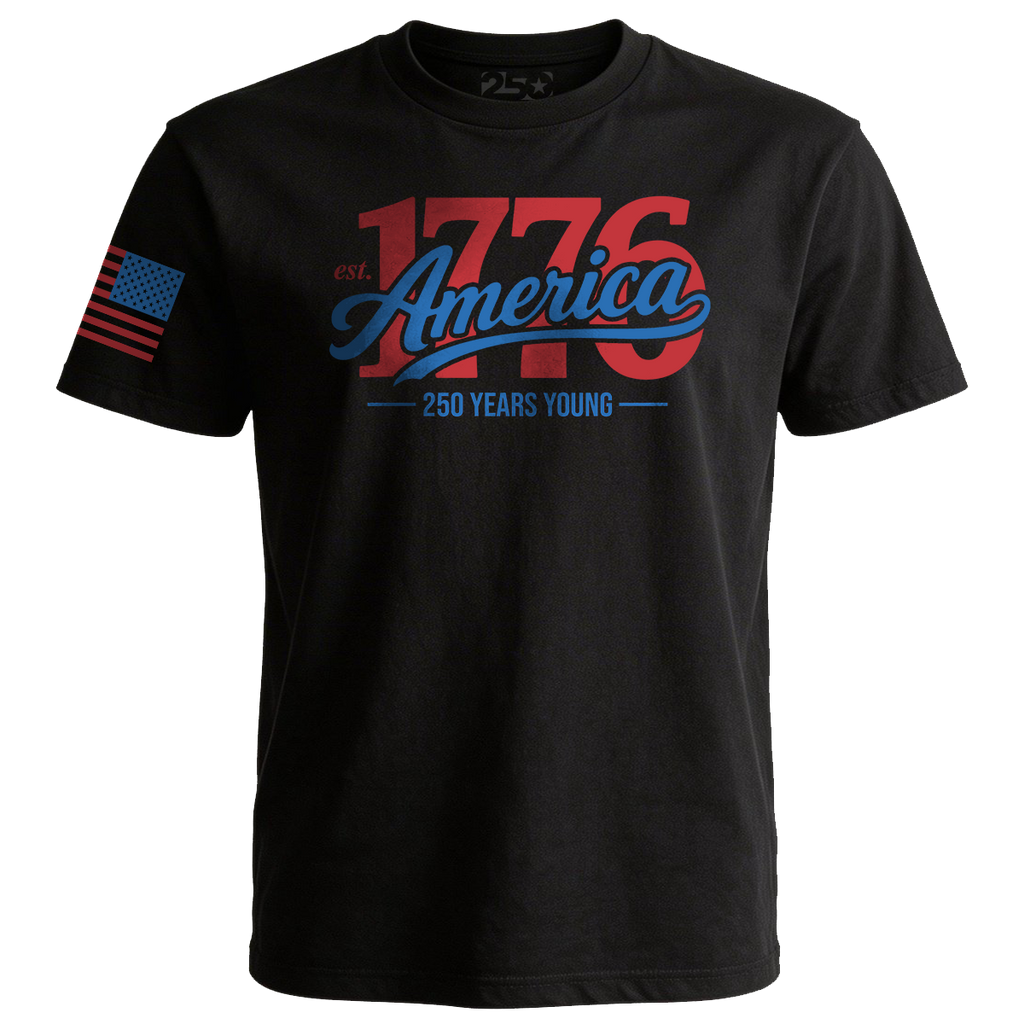 Black t-shirt featuring “1776 America” script design with “250 Years Young” text in red and blue patriotic colors and a stylized American flag on the sleeve.