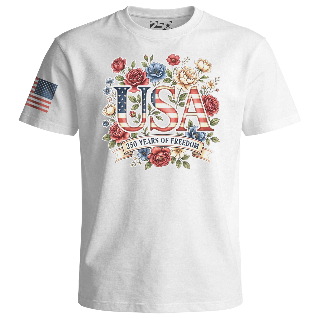 White t-shirt with 'USA 250 Years of Freedom' design featuring flowers and an American flag on a white background.
