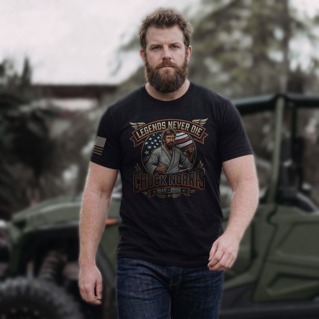 Black Chuck Norris tribute shirt worn by model featuring bold American pride design